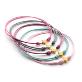 PACK de 5 pulseras Cruz dorada mini